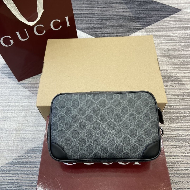 G*u*i clutch bags